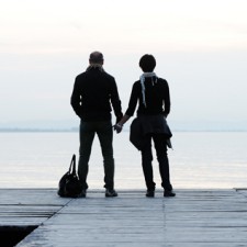 Lovely couple on a sea dock