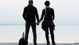 Lovely couple on a sea dock